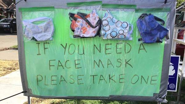 Woman makes 700 masks for her community, complete with welcoming front-yard display
