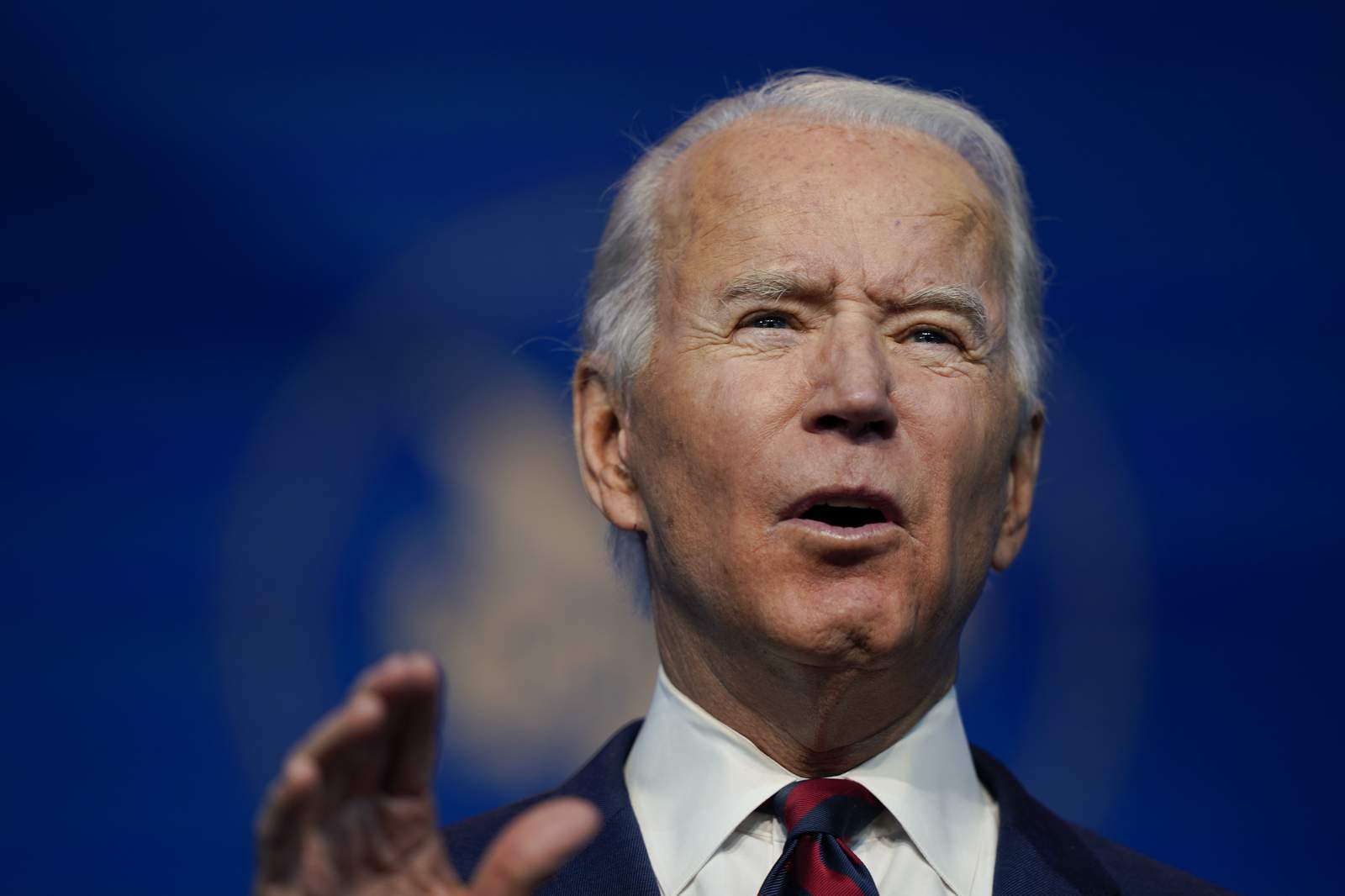 Biden introduces his climate team, says 'no time to waste'