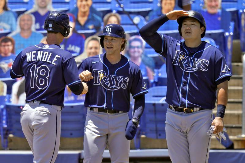 Rays win 11th in a row, score 7 in 11th to beat Toronto 14-8