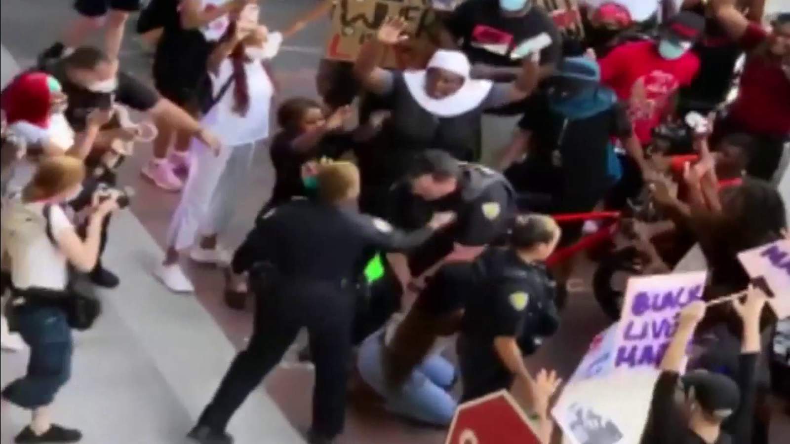 White Florida officer charged in shoving of Black woman