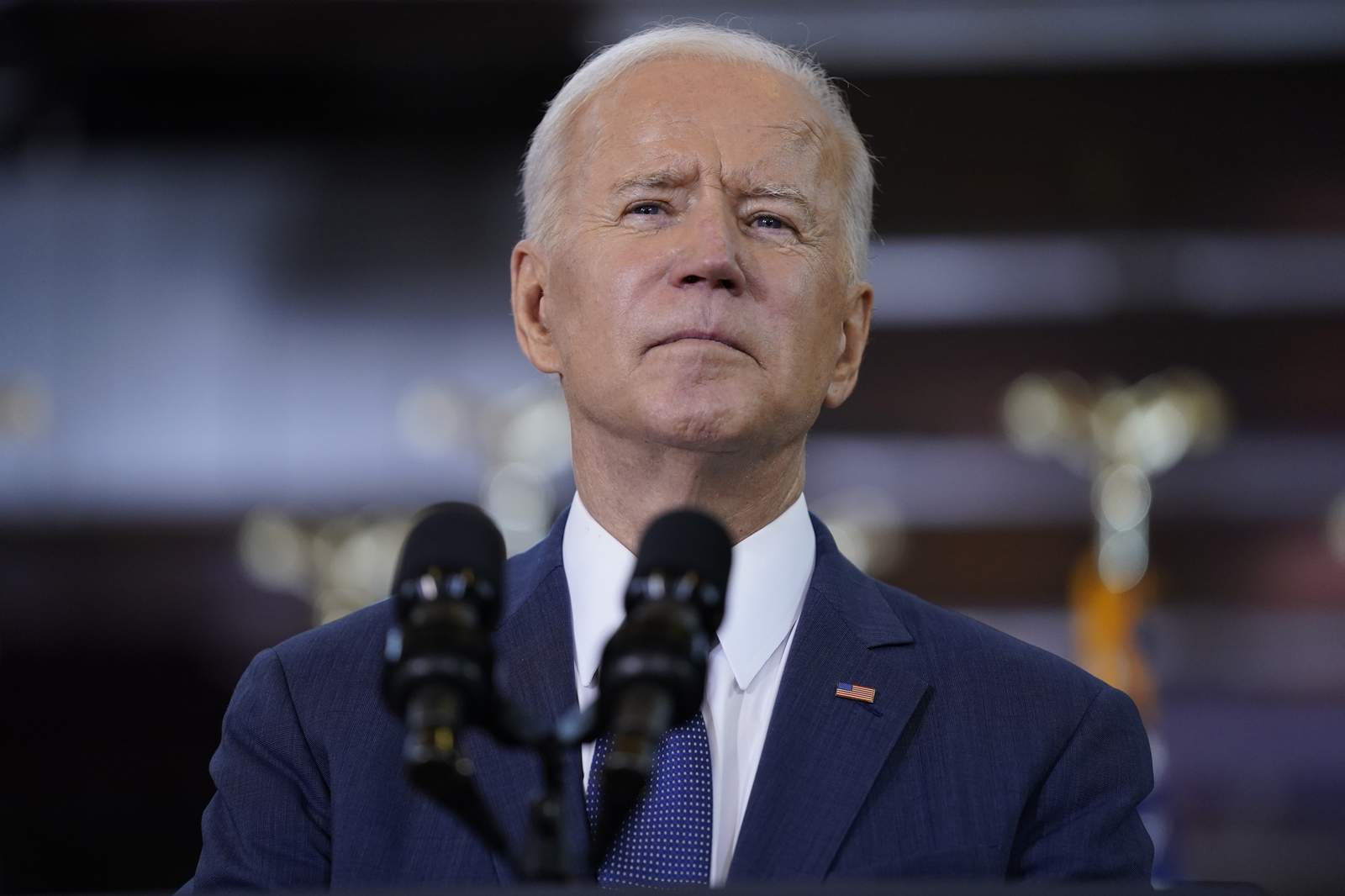 Biden says Rangers making mistake by allowing full capacity