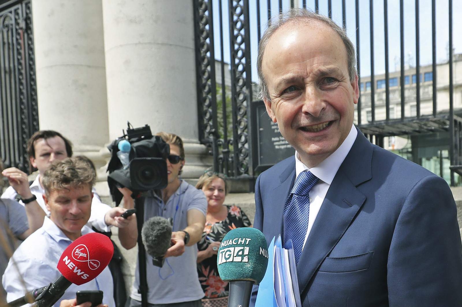 Rival Irish parties strike deal to form coalition government