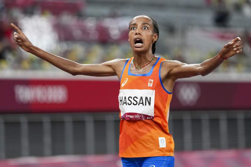 No keeping her down: After a fall, busy Hassan gets a gold