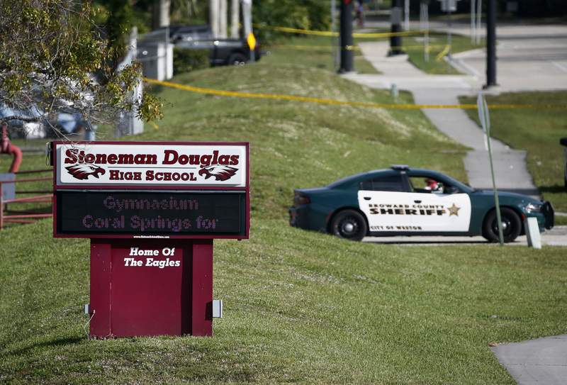 Florida school massacre families settle suit with district