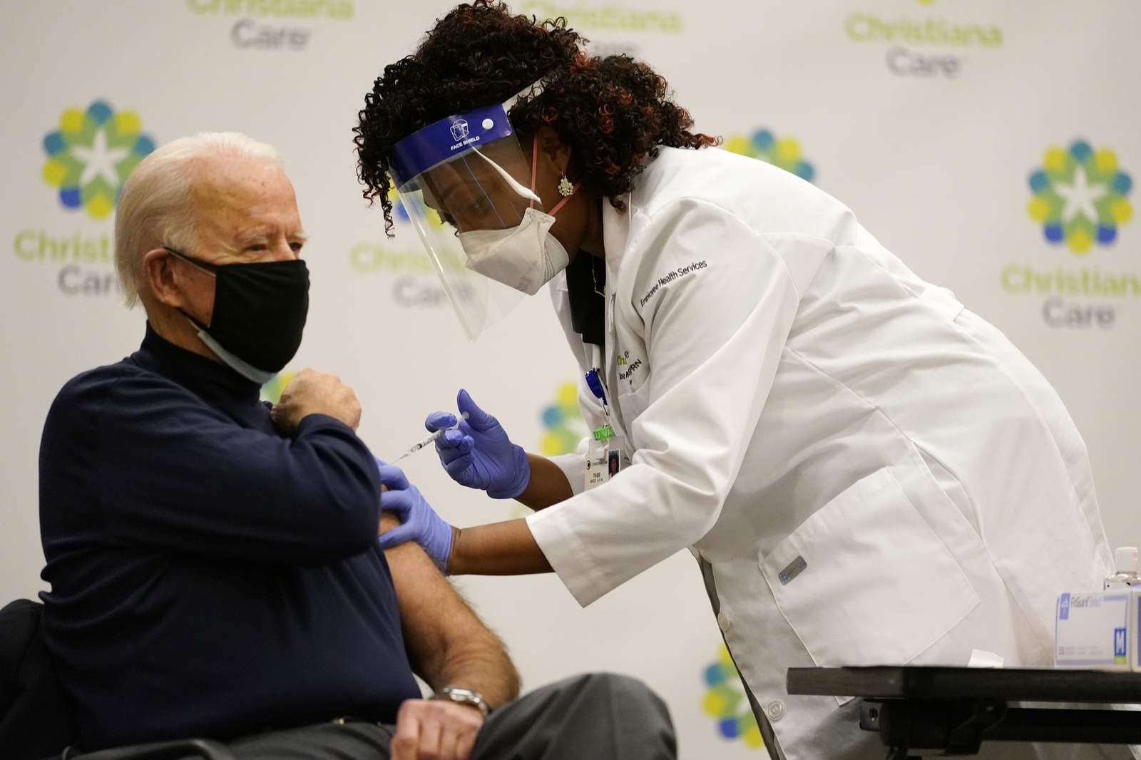 Biden receives COVID vaccine as Trump remains on sidelines