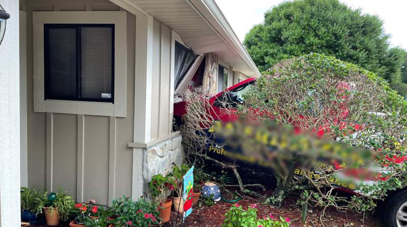 Pickup crashes into house in Brevard County