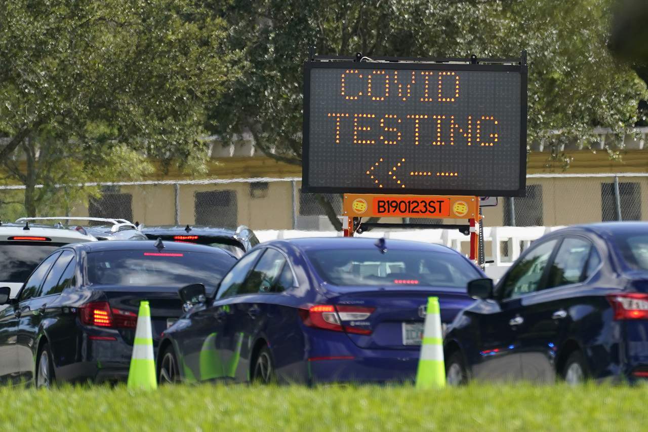 Florida reports 10,105 new COVID-19 cases as spectators swarm Space Coast for crewed launch