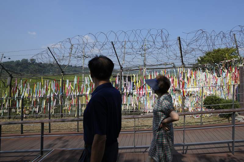 N. Korea, slimmed down Kim Jong Un, enjoy toned-down parade
