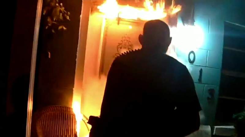 Video shows Ocala officer kicking in door to save woman, puppy after suspected arson fire