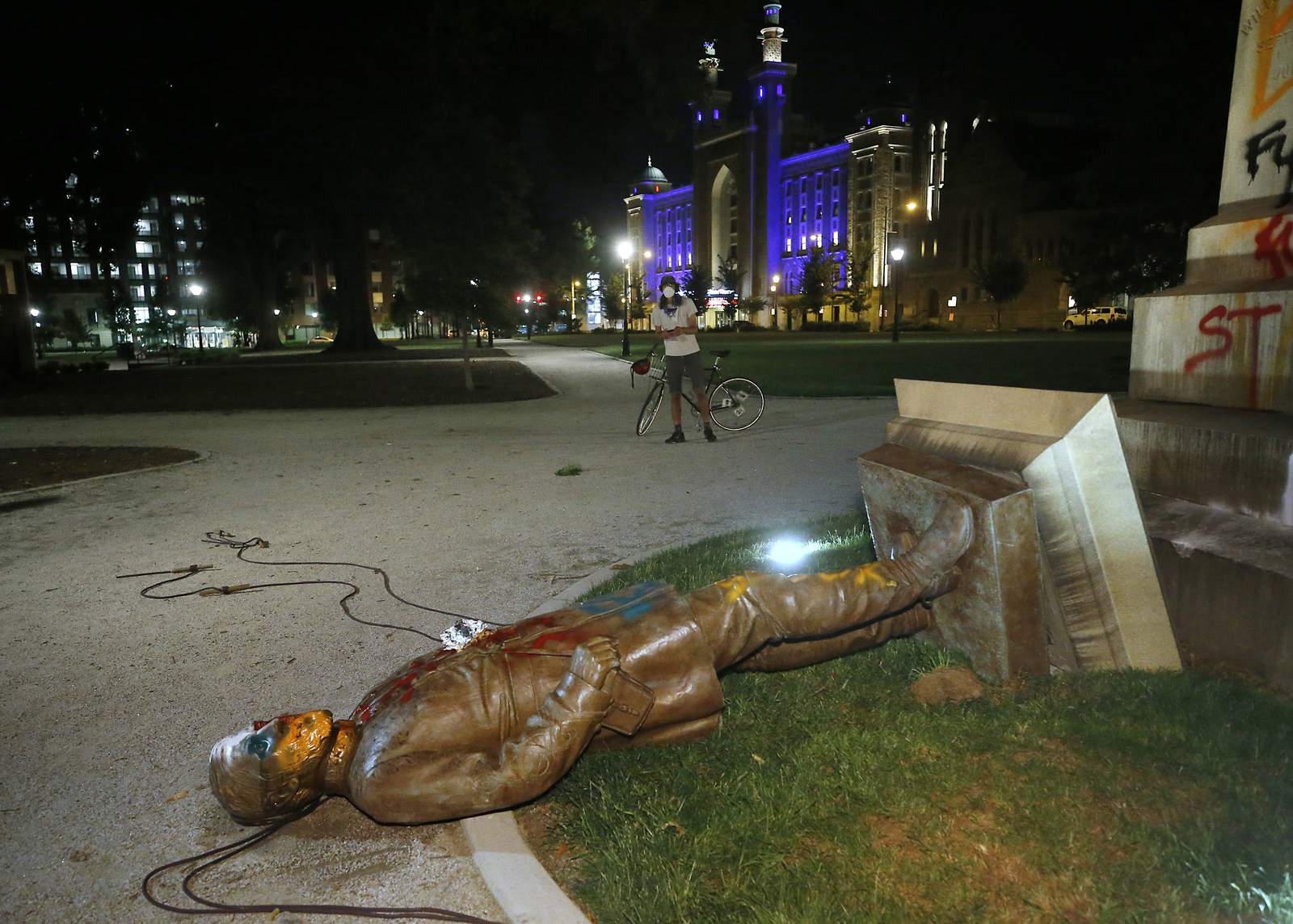 Protesters topple Confederate statue in Virginia capital