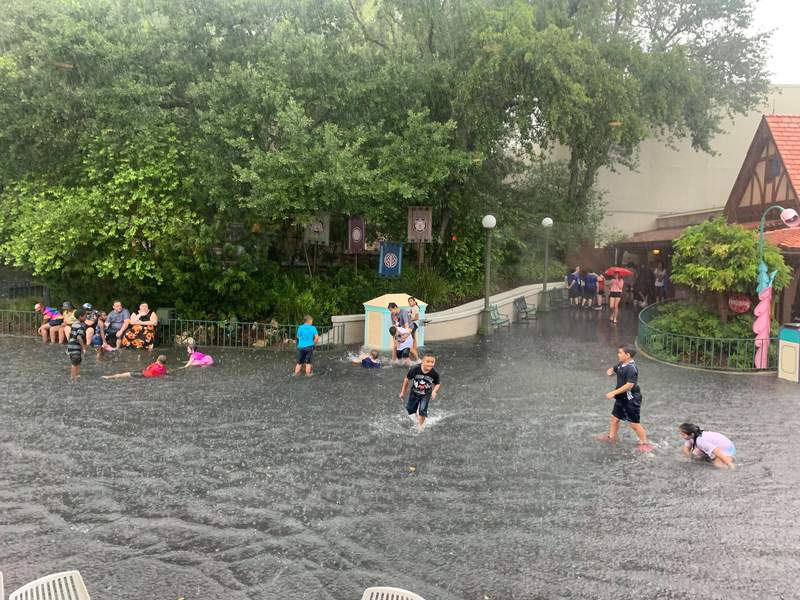 Water park? Disney guests swim in flooded Magic Kingdom streets