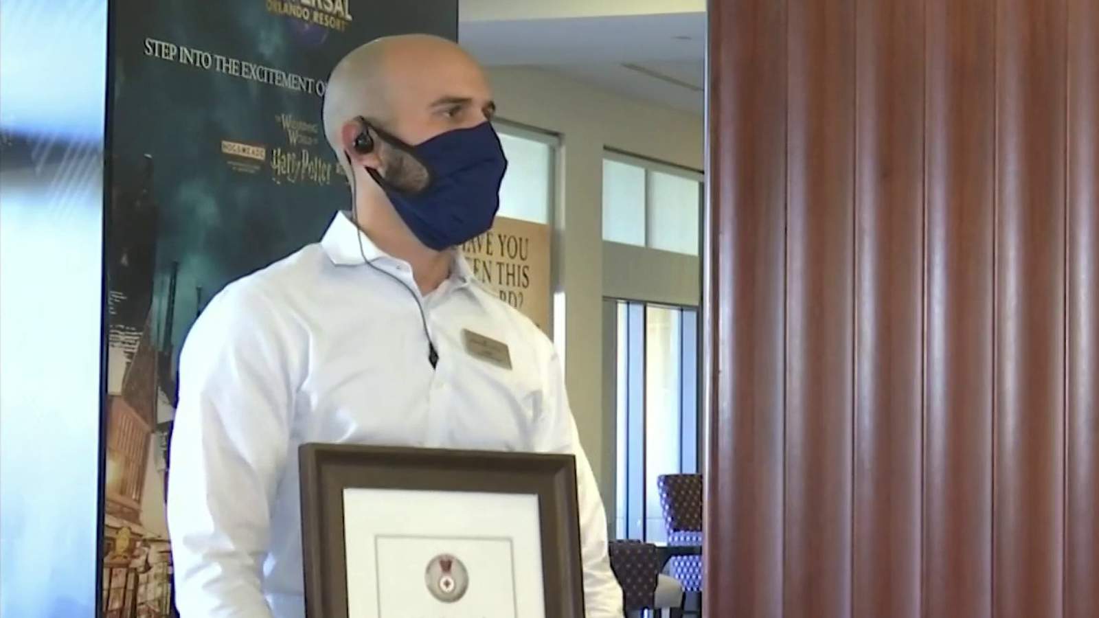 Orlando hotel worker honored for saving man’s life