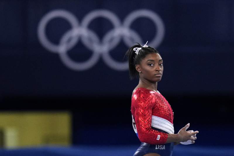 Olympic champ Simone Biles withdraws from all-around competition, citing mental health