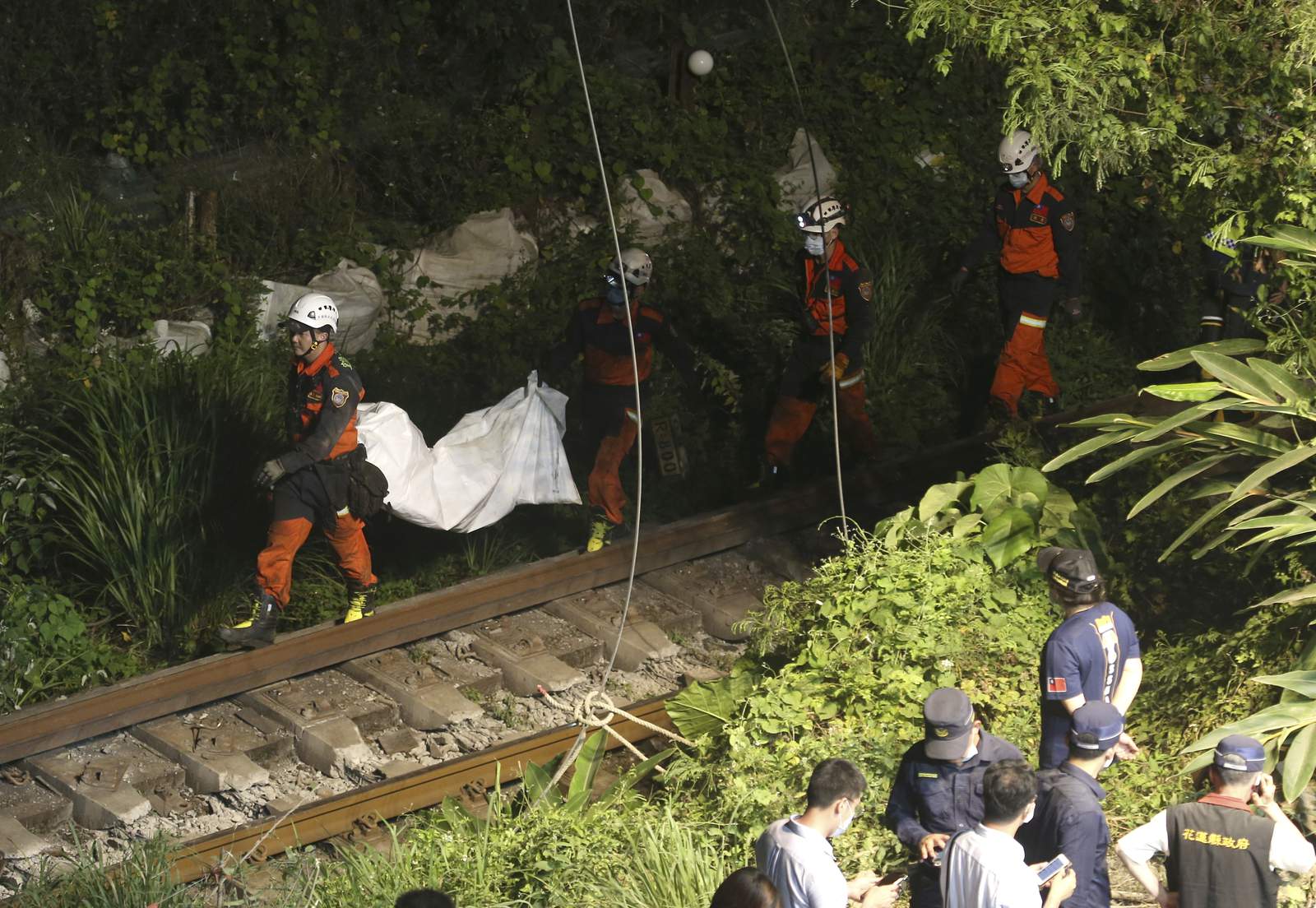 Train hits truck that slid onto track in Taiwan, killing 51