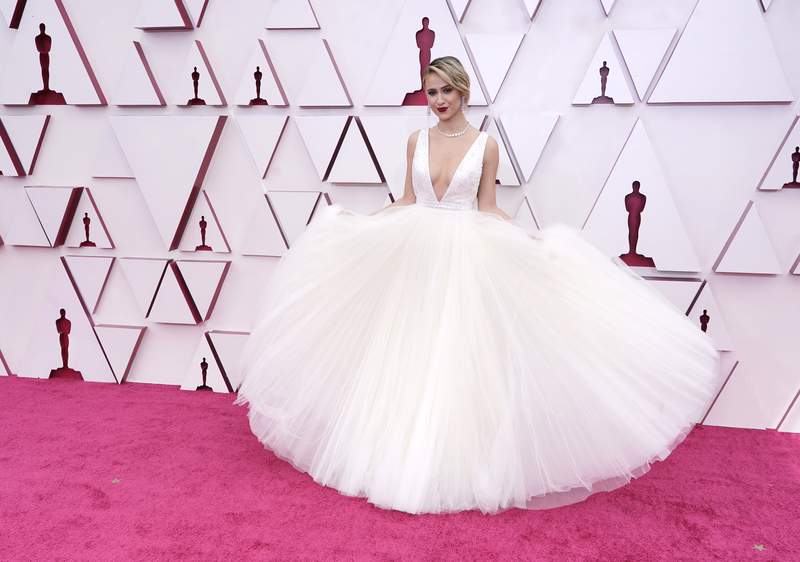The Oscars bring back red carpet glam in whites, reds, gold