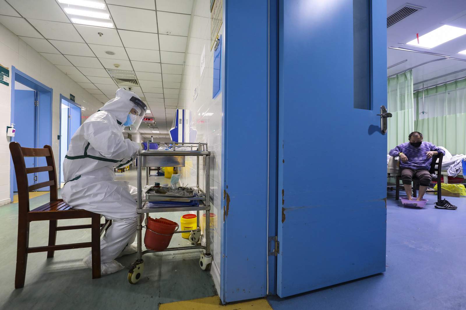 The Latest: WHO to send mission to virus-hit China