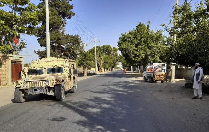 Taliban take key Afghan district, adding to string of wins