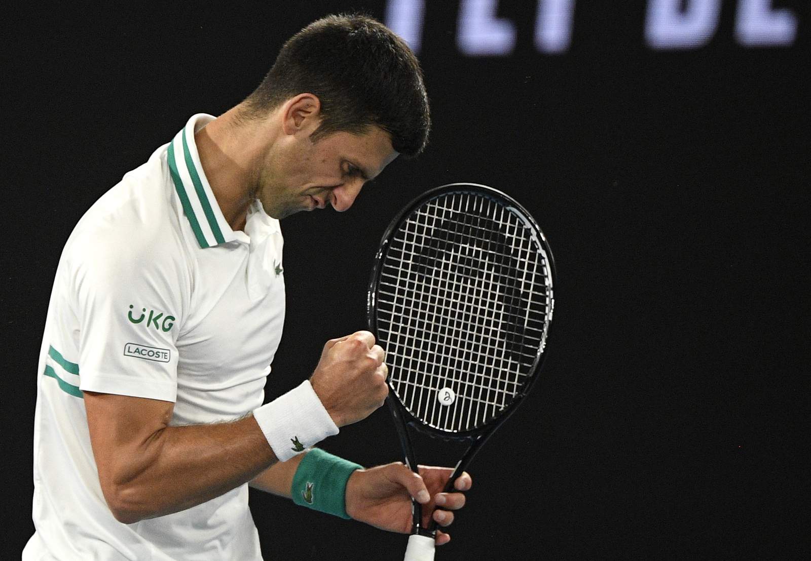 The Latest: Djokovic tops Medvedev for 18th Grand Slam title