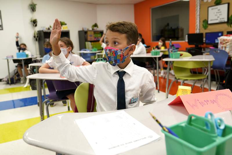 Florida withholds school board salaries from 2 districts with mask mandates