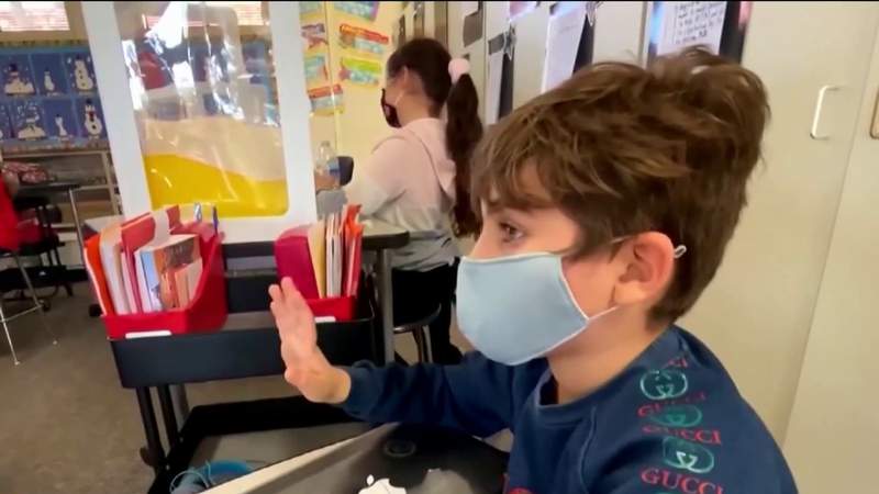 Students go back to school as parents gear up for new mask policy fight