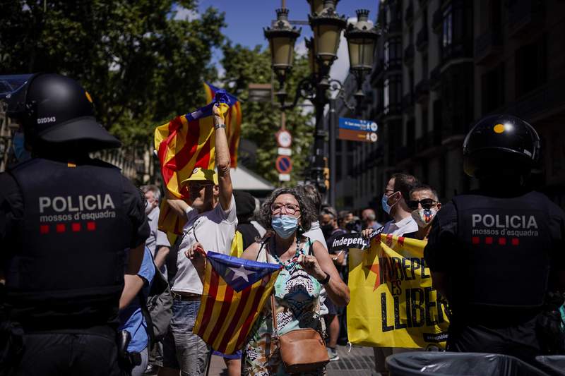 EXPLAINER: Why has Spain pardoned 9 Catalan separatists?