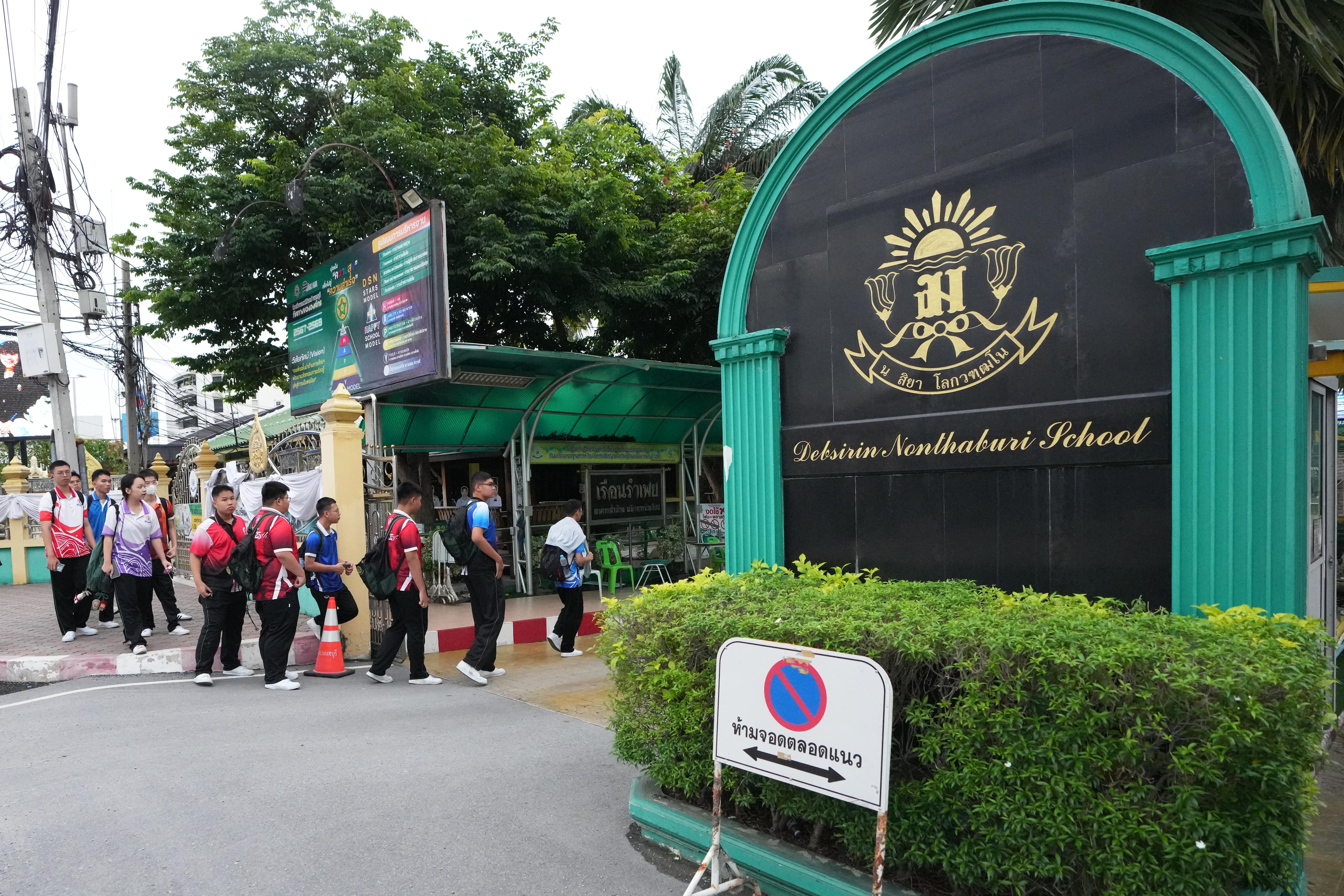 Student kills at least 7 people at a high school and a home outside Bangkok, officials say