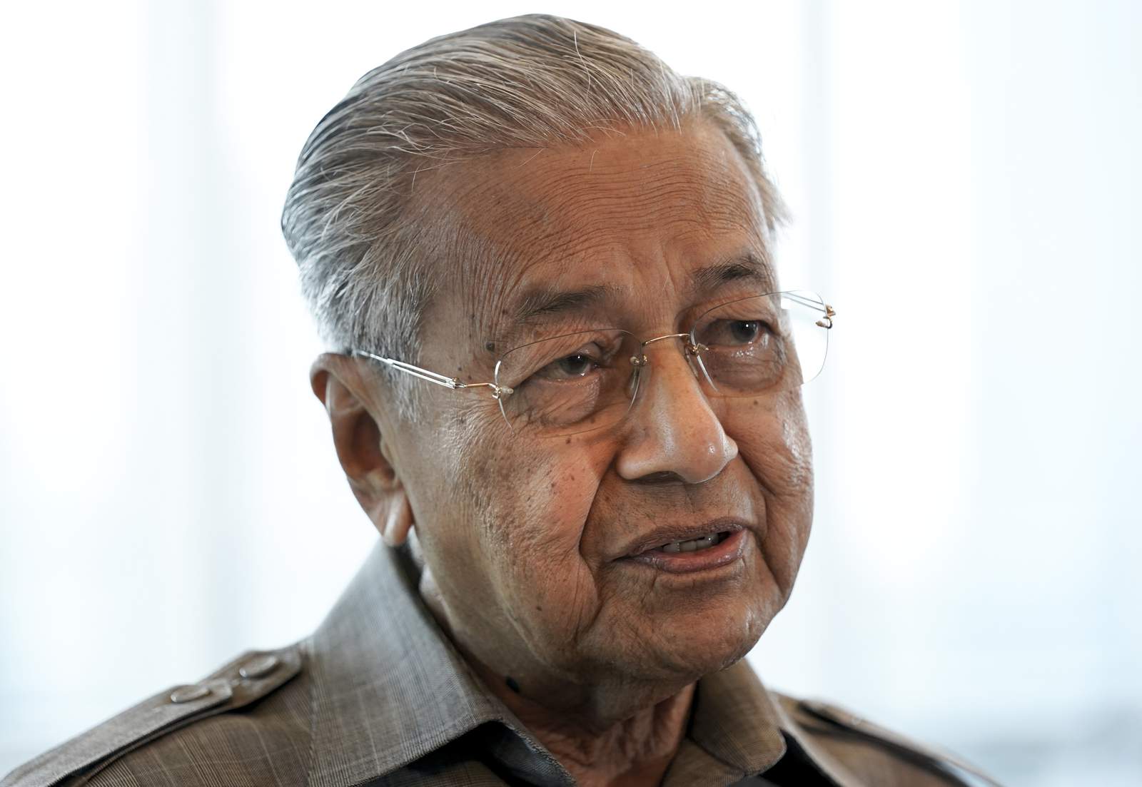 Mahathir says remarks on French attacks taken out of context