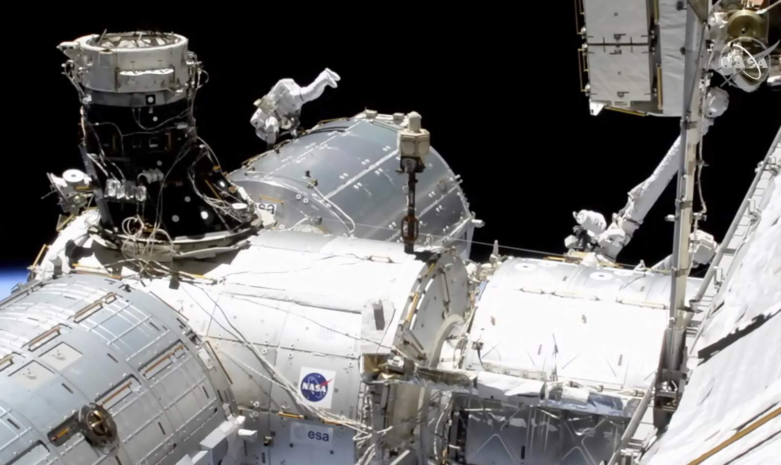 NASA astronauts conduct first spacewalk of 2021