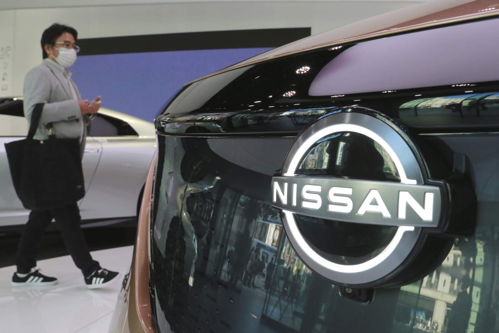 Japanese automaker Nissan posts loss amid pandemic, scandal