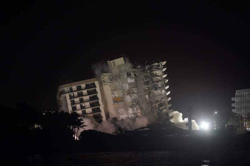 Explosives set off to bring down rest of collapsed condo