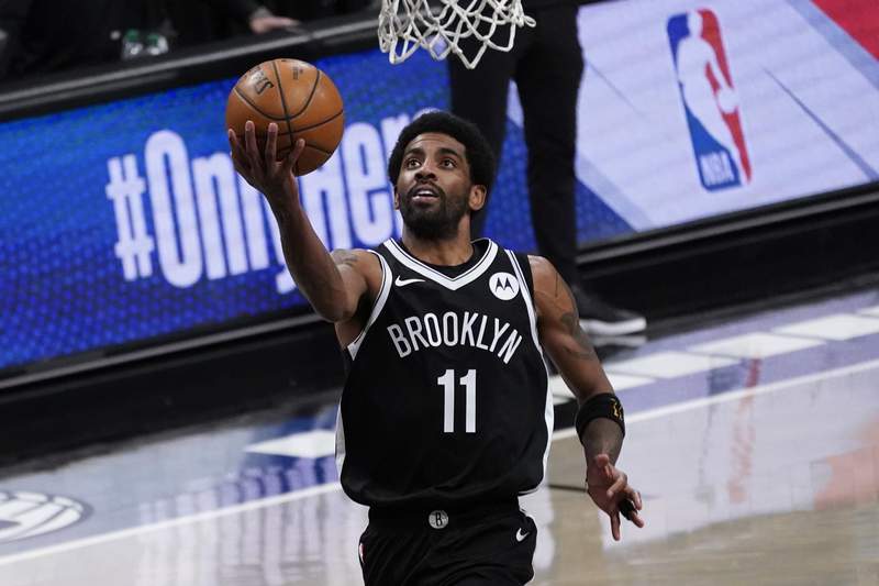 Nets back atop East after beating Celtics 109-104